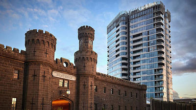 The Adina Apartment Hotel rises above one of Melbourne’s most infamous prisons, now decommissioned.