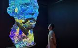 Giant bust of Vincent Van Gogh with evolving digital art.