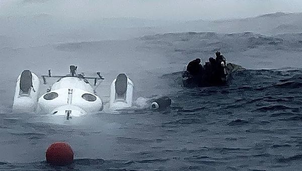 The front of the platform holding the submersible Titan went underwater for unknown reasons during an OceanGate Expedition mission last month. A crew, including OceanGate's CEO, Stockton Rush, prepared to dive under it to raise it.